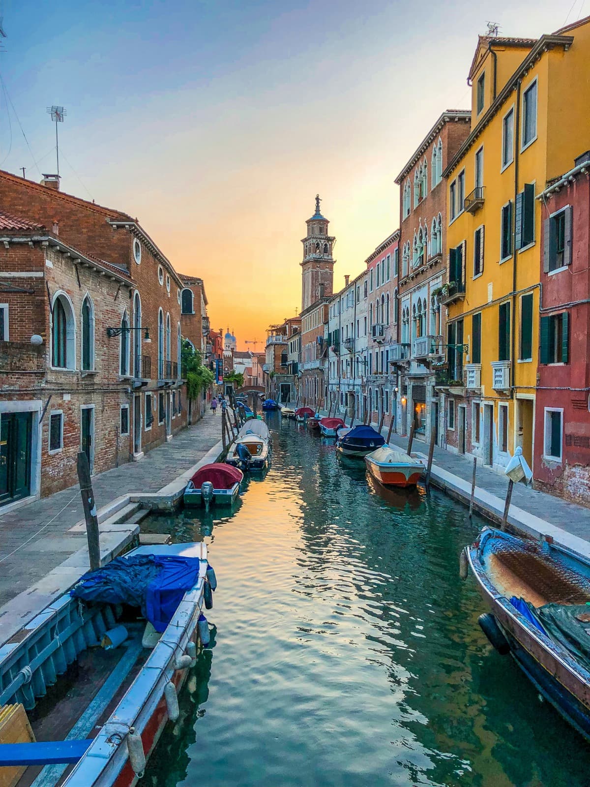Old-world European waterfront at golden hour