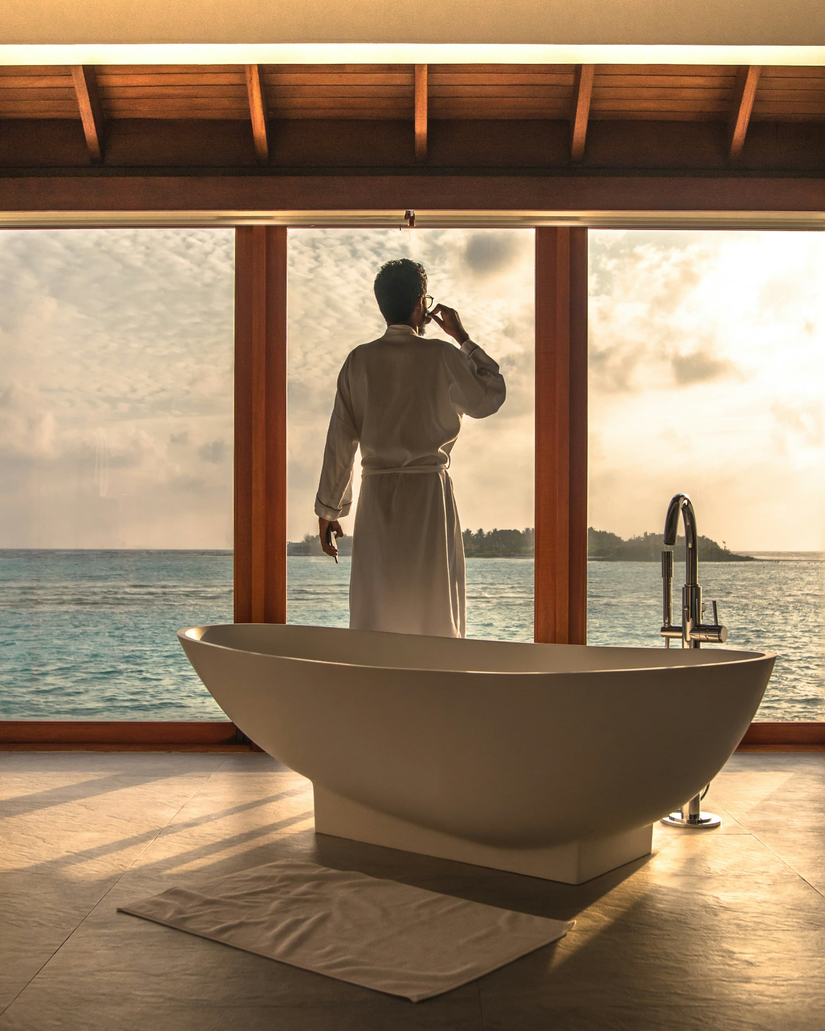 Overwater villas above turquoise water